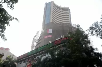 Equity indices trade lower; Sensex down by over 300 pts